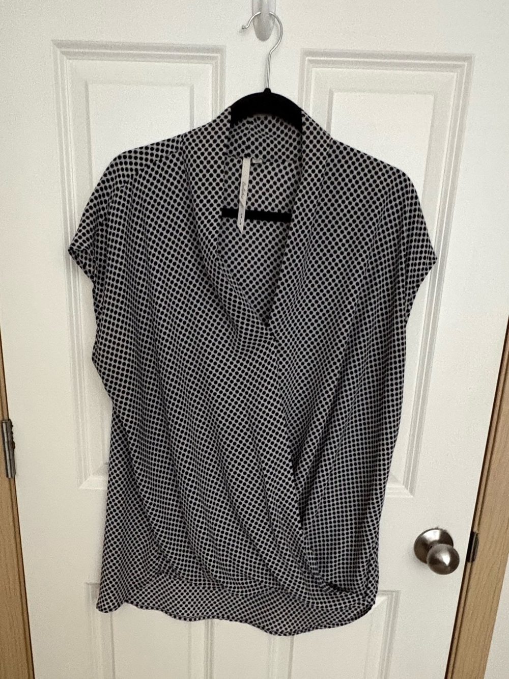 Geometric Wrap-Front Cap Sleeve Blouse in Black and White
